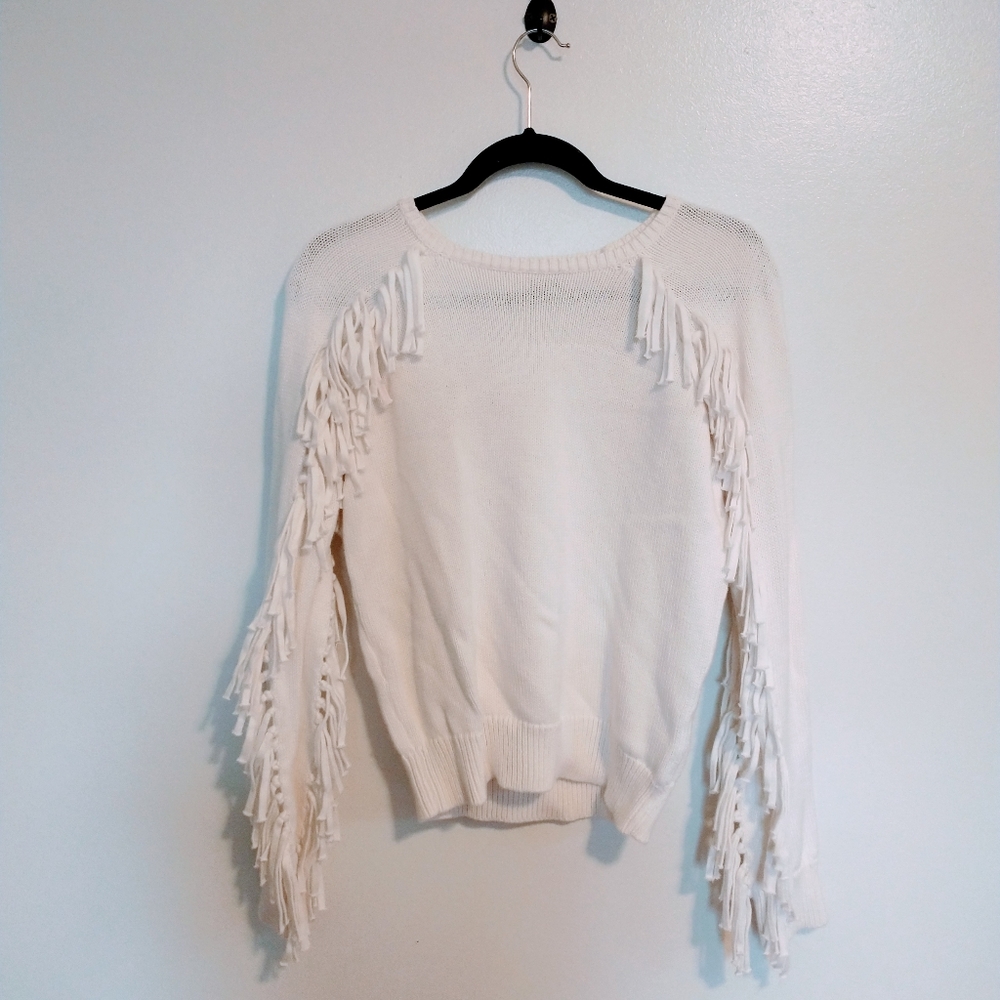 Denim fringe knit sweater with 2 rows of fringe on the arms.  Size small
